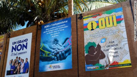 Boards with campaign posters by different political groups favoring or opposing New Caledonia's independence from France are seen during the referendum in Noumea, on the French overseas territory of New Caledonia.