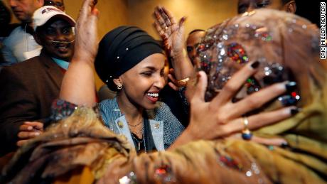 Democratic congressional candidate Ilhan Omar is greeted by her husband&#39;s mother after appearing at her midterm election night party in Minneapolis, Minnesota, U.S. November 6, 2018. REUTERS/Eric Miller