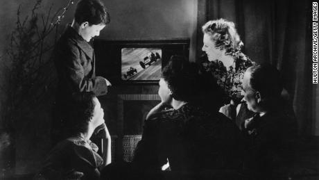 A family watches television circa 1938.