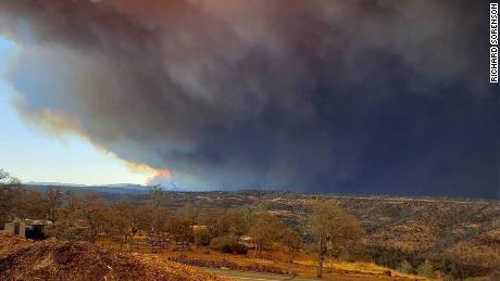 A Northern California fire is growing at a rate of about 80 football fields per minute