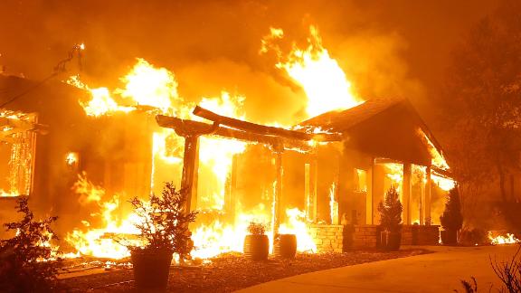 A Paradise home is engulfed in flames on November 8. 