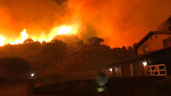 The Woolsey Fire burns in Ventura County, where Jason Bauer told CNN his parents had just been evacuated from their home.