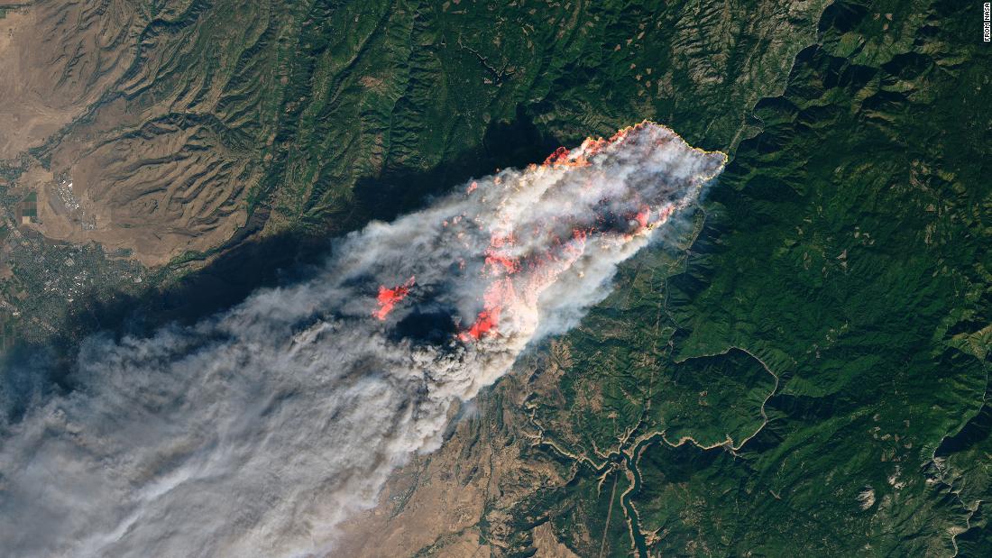 A satellite image taken by NASA&#39;s Operational Land Imager shows the Camp Fire in Northern California.