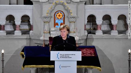 Merkel speaks during a ceremony at the Rykestrasse Synagogue in Berlin on November 9.