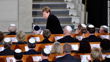 Merkel takes her seat again after speaking the Rykestrasse Synagogue in Berlin on Friday.