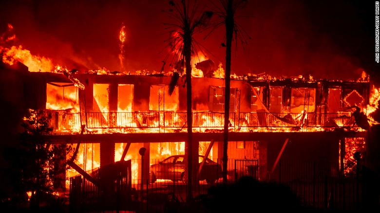 The Paradise Inn burns as the Camp Fire tears through Paradise on Thursday, November 8. A state of emergency has been declared in Butte County, where thousands have been forced to evacuate.