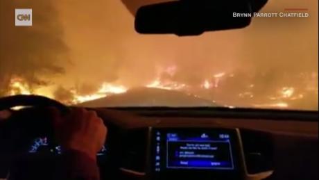 Family prays as they drive through wildfire