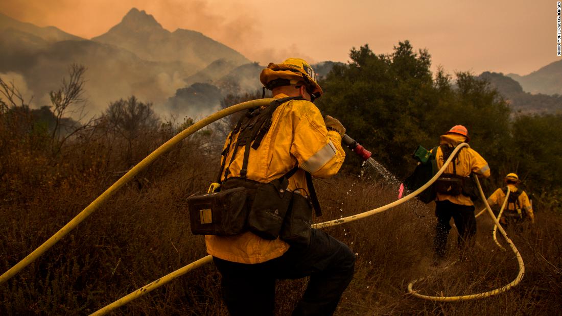 Los Angeles County firefighters work in Malibu Creek State Park on November 10.