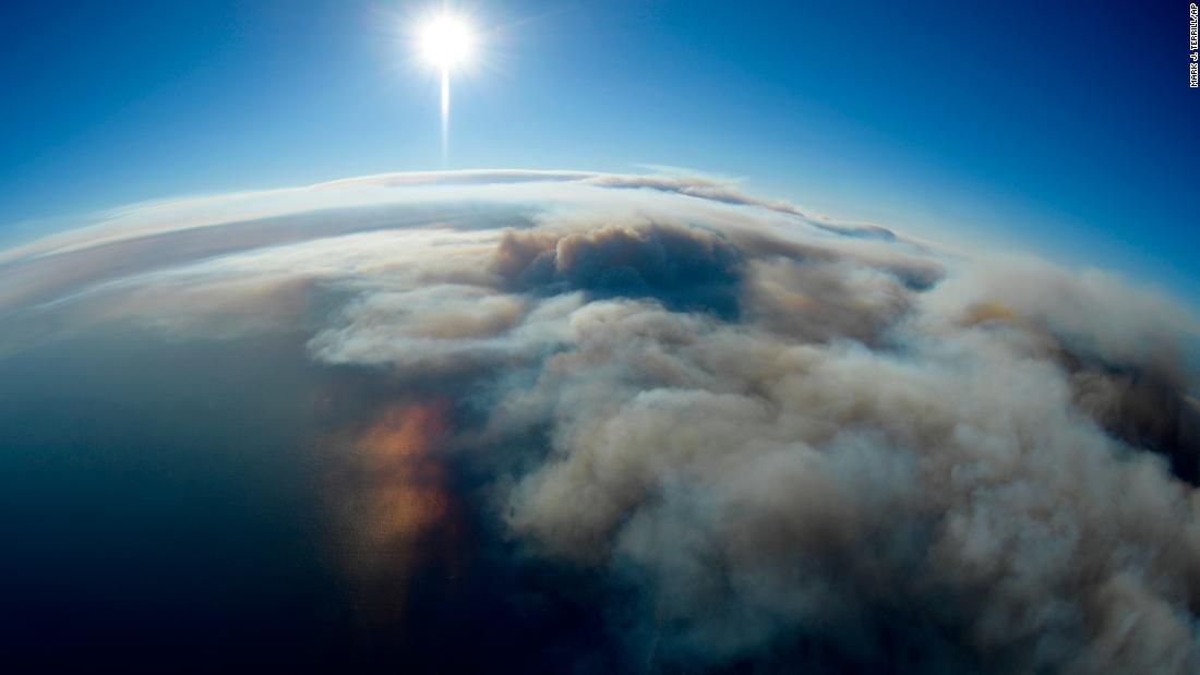 Smoke is seen over the Pacific in this photo taken from a helicopter over Malibu on November 9.