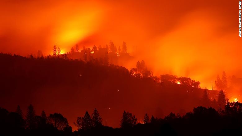 BIG BEND, CA - NOVEMBER 10:  The Camp Fire burns in the hills on November 10, 2018 near Big Bend, California. Fueled by high winds and low humidity the Camp Fire ripped through the town of Paradise charring 105,000 acres, killed 23 people and has destroyed over 6,700 homes and businesses. The fire is currently at 20 percent containment.  (Photo by Justin Sullivan/Getty Images)