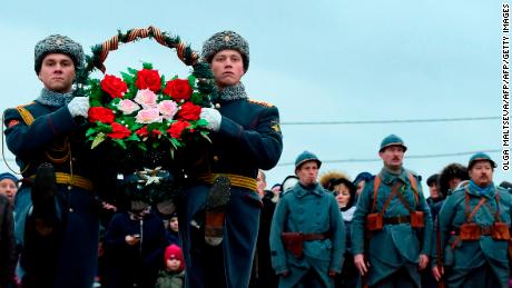 Russian honour guards carry wreaths marking the centenary of the Armistice Day at the Brotherly cemetery of WWI heroes in Tsarskoye Selo outside Saint Petersburg.