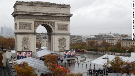 World leaders joined French President Emmanuel Macron at the Tomb of the Unknown Soldier, which lies at the foot of the Arc de Triomphe monument in Paris.