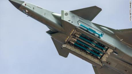 A J-20 fighter of the Chinese air force shows its load of long-range missiles at Airshow China in Zhuhai on Sunday.