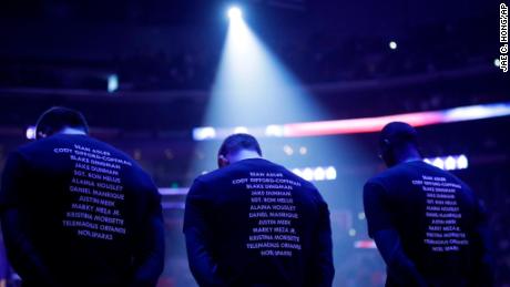 NBA Players wear T-shirts bearing the names of the 12 victims killed at Borderline Bar & Grill in Thousand Oaks, California, before a game on November 10 in Los Angeles.