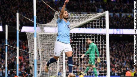 Ilkay Gundogan of Manchester City celebrates after scoring his team's third goal against cross-town rival Manchester United.