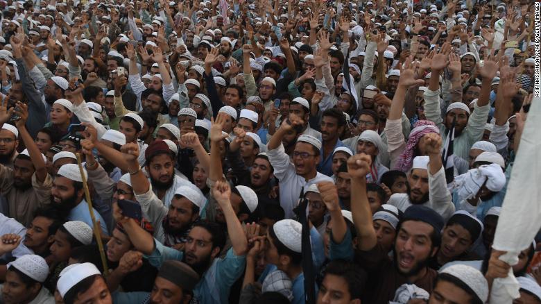 Supporters of the Pakistani religious Islamist group Mutahida Majlis-e-Amal (MMA) gather during a protest rally against the release of Asia Bib in early November.