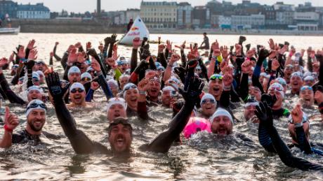 Edgley was joined by 300 swimmers for the final mile of his epic around-Britain swim. 