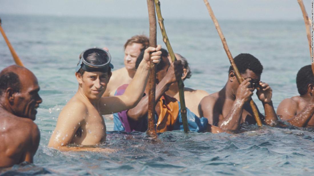 Charles fishes with a wooden spear circa 1975.