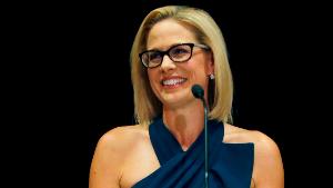 Newly-elected U.S. Sen. Kyrsten Sinema, D-Ariz., declares victory over Republican challenger U.S. Rep. Martha McSally, Monday, Nov. 12, 2018, in Scottsdale, Ariz. Sinema won Arizona's open U.S. Senate seat in a race that was among the most closely watched in the nation, beating McSally in the battle to replace GOP Sen. Jeff Flake. (AP Photo/Rick Scuteri)