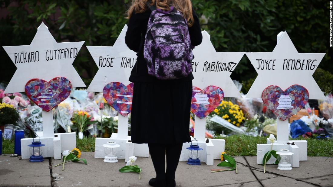 A woman mourns at a memorial outside the Tree of Life synagogue in Pittsburgh.