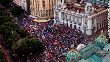 Demonstrators take part in a protest against Jair Bolsonaro, called by a social media campaign under the hashtag #EleNao (NotHim), in Rio de Janeiro on October 20.