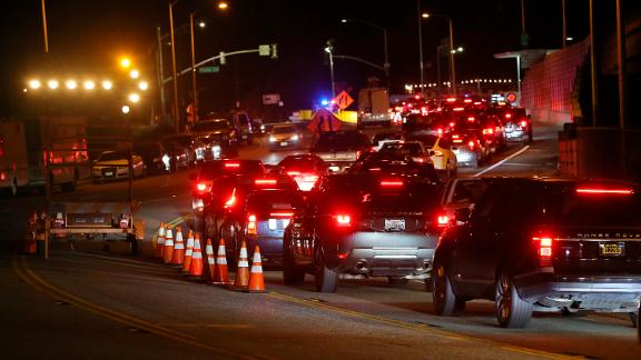 A long line of residents seeking to return to Malibu wait at a checkpoint on November 13 on Pacific Coast Highway after Woolsey Fire evacuation orders were lifted for the eastern portion of the city.