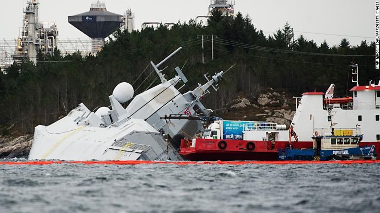 The KNM Helge Ingstad pictured on November 10, 2018 in the Hjeltefjord near Bergen. The frigate, which was returning from NATO's Trident Juncture exercises, was evacuated after the collision with the Sola TS tanker, Norway's army said.