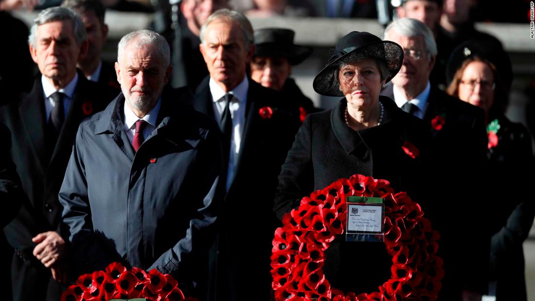 May stands next to Labour Party leader Jeremy Corbyn at a Remembrance Day ceremony in London in November 2018. Behind them, from left, are former Prime Ministers Gordon Brown and Tony Blair.