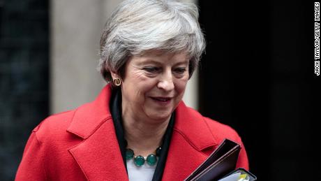 Theresa May vows to fight for Brexit plan in face of turmoil