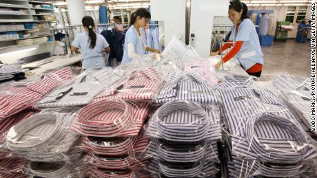 Workers arranging shirts at a factory in Hanoi, Vietnam in 2014. Trade tensions have accelerated the shift of manufacturing from China to countries in Southeast Asia, where labor is cheaper.