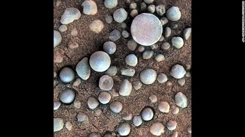 What are blueberries doing on Mars? These small, mineral hematite-rich concretions are near Fram Crater, visited by NASA&#39;s Opportunity rover in April 2004. The area shown is 1.2 inches across. The view comes from the microscopic imager on Opportunity&#39;s robotic arm, with color information added from the rover&#39;s panoramic camera. These minerals suggests that Mars had a watery past.
