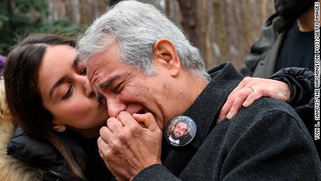 Negeen Ghaisar, left, comforts her father, James Ghaiser, after they tried to talk to someone at the US Park Police George Washington Memorial Parkway Station about the death of Bijan Ghaisar on December 24, 2017.