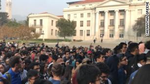 Students at the University of California, Berkeley wait for respirators distributed by a student-led organization Thursday.