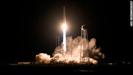 In this photo released by NASA, the Northrop Grumman Antares rocket, with Cygnus resupply spacecraft onboard, launches from Pad-0A, Saturday, Nov. 17, 2018 at NASA&#39;s Wallops Flight Facility in Va. (Joel Kowsky/NASA via AP)