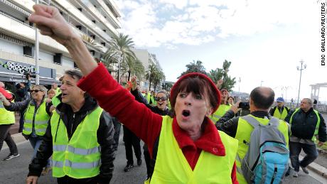 Protesters wearing yellow vests demonstrate on the Promenade des Anglais in Nice, southern France, on Saturday.