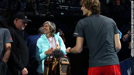 Zverev greets his parents (and dog Lovik) after winning the ATP Finals.