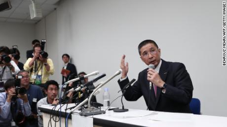 Nissan Motors CEO Hiroto Saikawa speaks during a press conference, detailing the allegations against Ghosn.