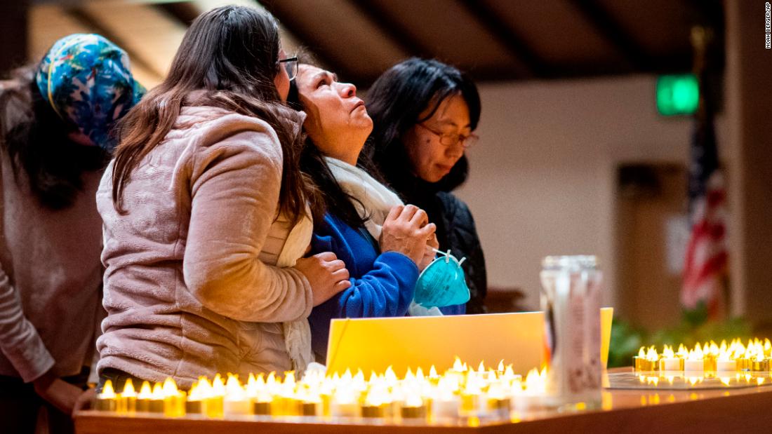 Lidia Steineman, who lost her home in the Camp Fire, prays during a vigil for fire victims on November 18 in Chico, California. More than 50 people gathered at the memorial service.
