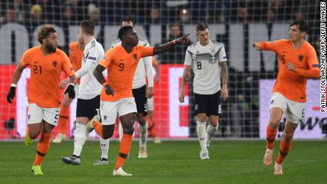 Dutch forward Quincy Promes celebrates after scoring his team's first goal on the 85th minute.