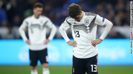 Thomas Muller of Germany looks dejected following his side's draw.