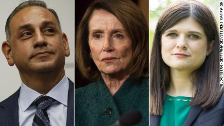 Pictured above, Rep.-elect Gil Cisneros of California, at left, House Democratic Leader Nancy Pelosi at center, and Rep.-elect Haley Steven of Michigan at right.