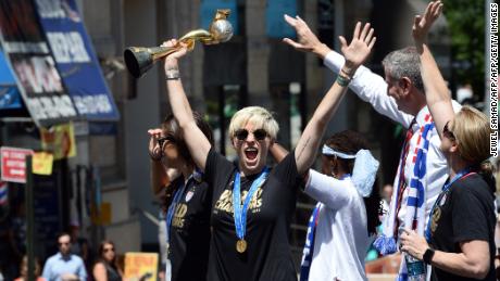 Rapinoe and her teammates celebrate Women's World Cup success in 2015 with a ticker tape parade in New York.