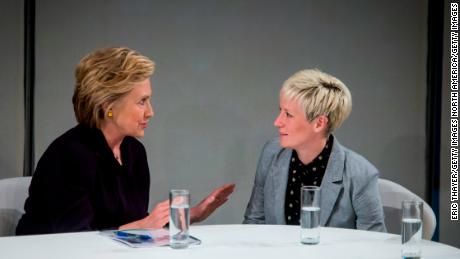 Rapinoe talks to then Democratic presidential candidate Hillary Clinton during a roundtable discussion on pay equality. 