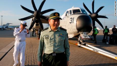 Tan Benhong, a lieutenant general of the People's Liberation Army (PLA) of China, arrives Hong Kong airport after visiting the USS Ronald Reagan on Tuesday.