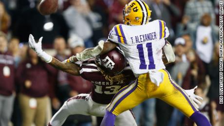 Kendrick Rogers of the Aggies makes a catch in overtime for a touchdown.