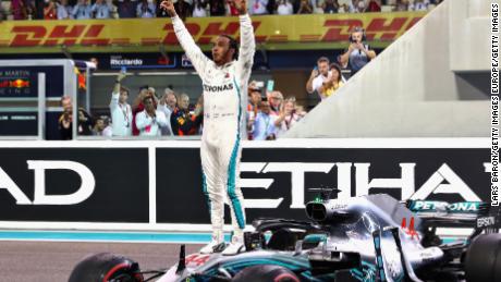 Race winner Lewis Hamilton of Great Britain and Mercedes celebrates after his 11th win of the season.