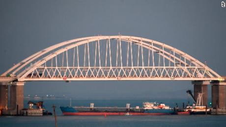 A ship under the the Kerch bridge blocks the passage to the Kerch Strait near Kerch, Crimea, on Sunday.