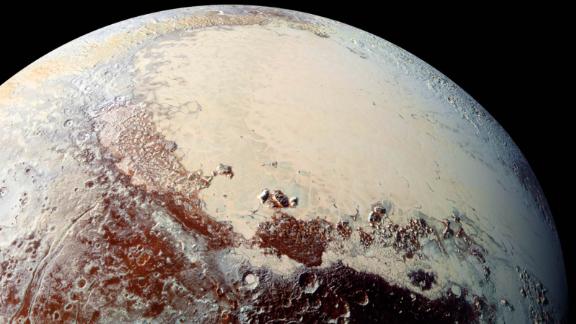 Why Pluto Is No Longer A Planet Or Is It Cnn