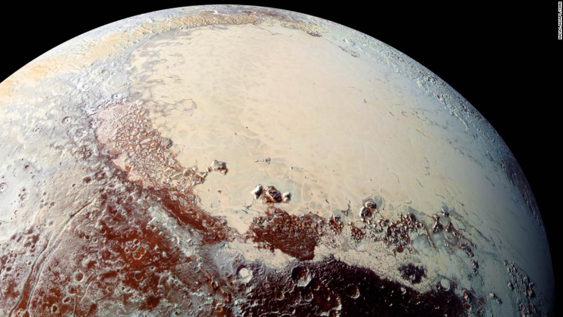 This high-resolution image captured by NASA&#39;s New Horizons spacecraft shows Pluto&#39;s surface has a remarkable range of subtle colors, enhanced in this view to a rainbow of pale blues, yellows, oranges, and deep reds. The bright expanse is the western lobe of the &quot;heart,&quot; informally known as Tombaugh Regio. The lobe, informally called Sputnik Planum, has been found to be rich in nitrogen, carbon monoxide, and methane ices.