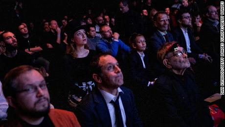 The crowd watch Fabiano Caruana and Magnus Carlsen take part in the final